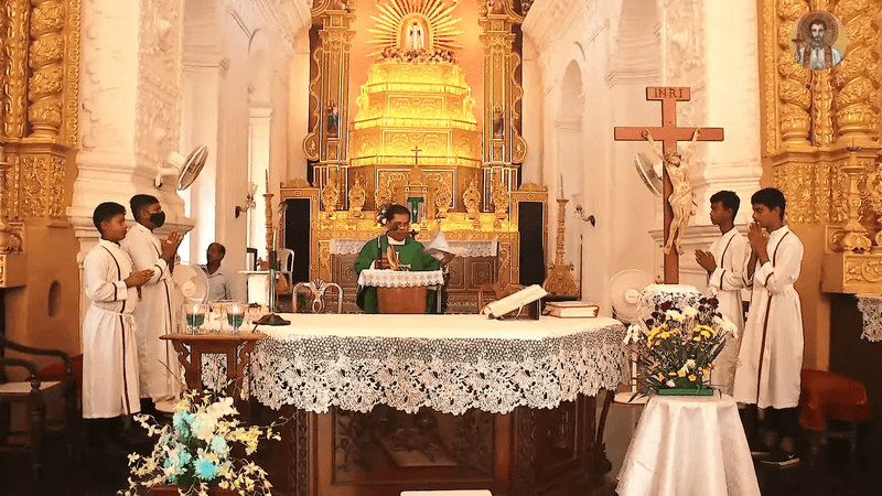 Fr. Peter Fernandes along with the altar servers