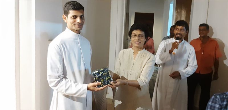 Fr. Camilo Dias receives a token of appreciation